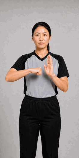 Charging with the ball signal: A clenched fist striking the open palm of the other hand.