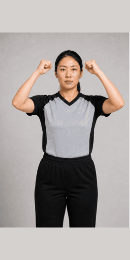 双方犯规手势示意图:双臂弯曲举起,握紧双拳并在额头前交叉挥动。